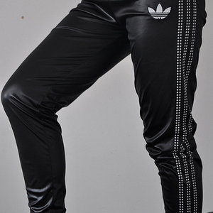 Adidas womans tight shiny black pants with white stripes small logo side