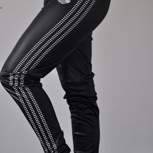 Adidas womans tight shiny black pants with white stripes small logo other side