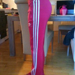 Adidas womens pink pants close side angle shot