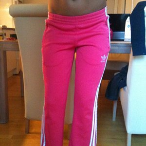 Adidas womens pink pants close front angle shot