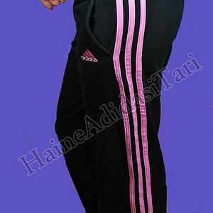 Adidas womens black pants pink stripe close angle