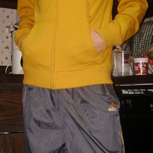 Gray Adidas Pants with Yellow Stripes