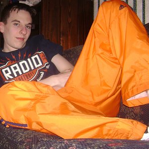 Adidas Orange Pants with Navy Stripes