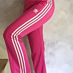 Girl in Adidas pink/white pants