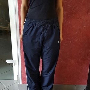 Girl in Adidas pants