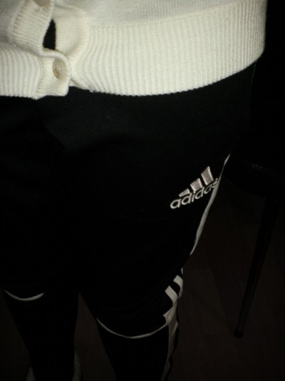 Adidas black womens pants small logo close shot