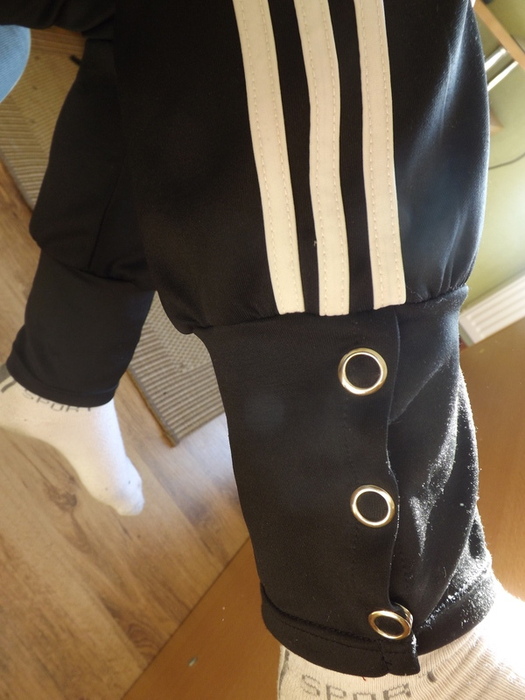 Adidas womans black pants with white stripes shin buttons