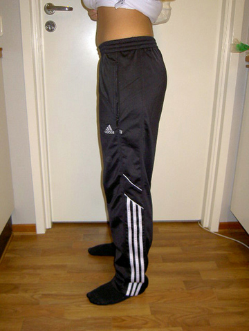 Adidas womans black pants with white trim solid top