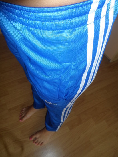 Adidas womans blue pants super close angle shot barefoot