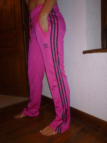 Adidas womans dark pink pants with blue stripes