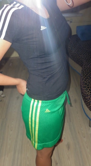 Adidas womans green pants with white stripes black no sleeve top side