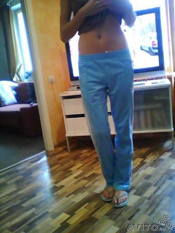 Adidas womans light blue pants barefoot front shot