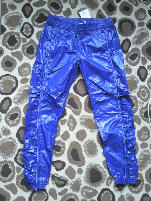 Adidas womans shiny blue nylon pants