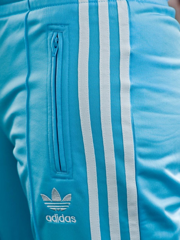 Adidas womans sky blue pants side shot zipper view