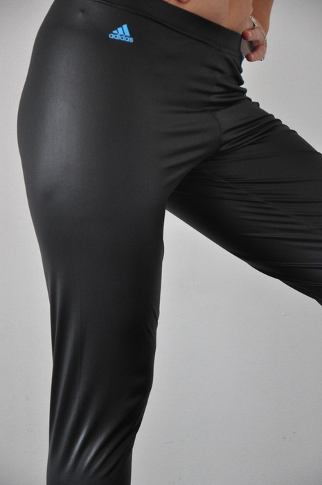 Adidas womans tight shiny black pants side close