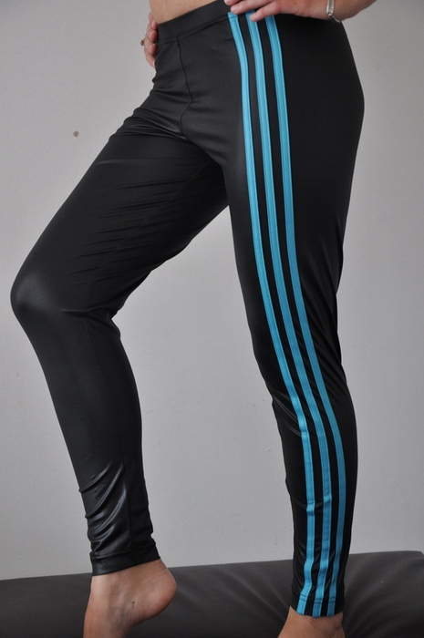 Adidas womans tight shiny black pants with blue stripes front