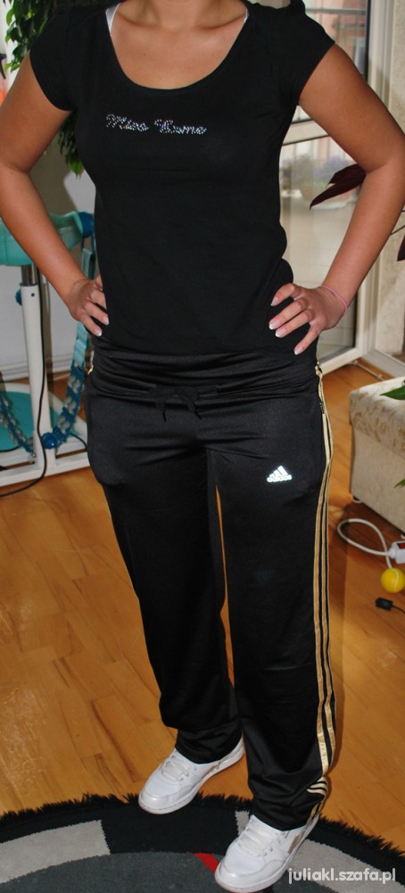 Adidas womens black pants hands on hips