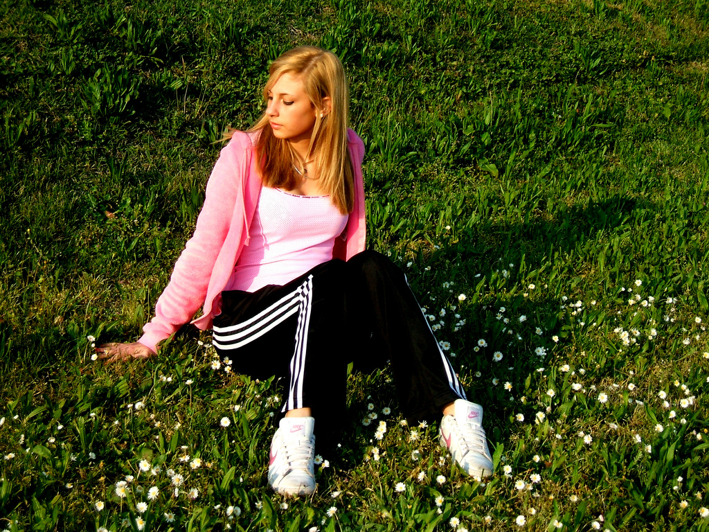 Adidas womens black pants pink top grassy hillside