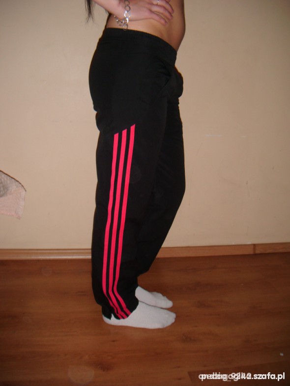 Adidas womens black pants red stripes side view