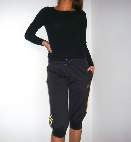 Adidas womens black suit casual pose