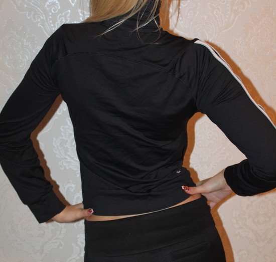 Adidas womens black top hip pose rear