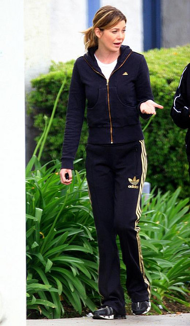 Adidas womens black track suit gold stripe