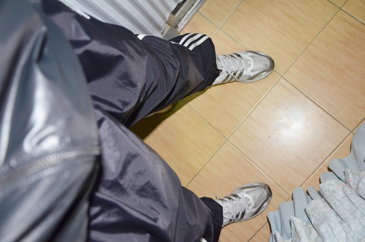 Black adidas shiny pants and jacket.