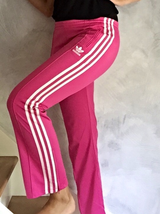 Girl in Adidas pink/white pants