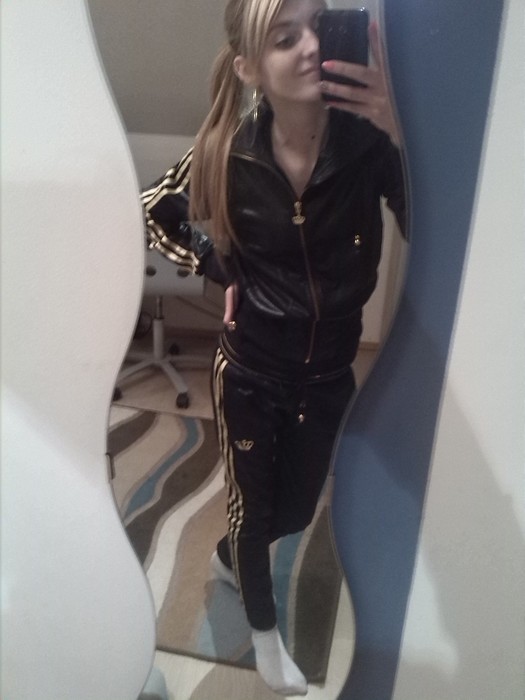 Girl in Adidas Respect ME suit