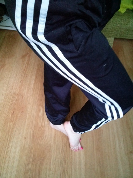 Girl with black/white adidas pants