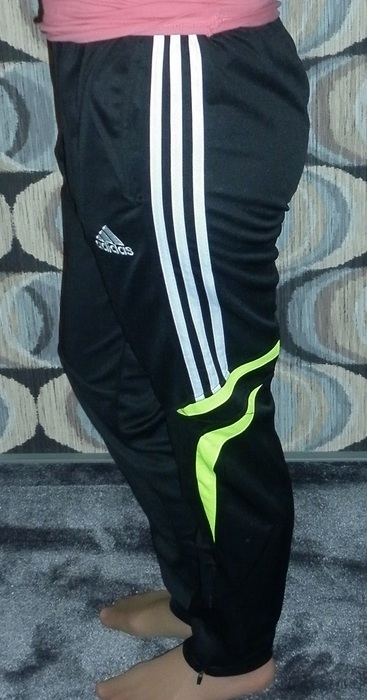 Girl with black/white adidas pants