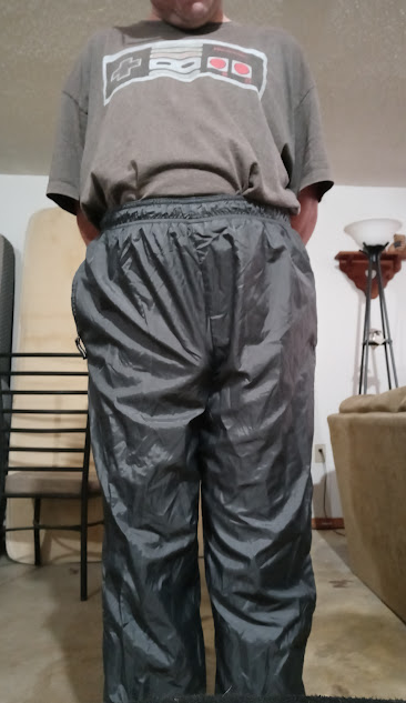 Hands behind my back in my Gray Shirt and my Medium Gray Athletic Works Nylon Pants 1A