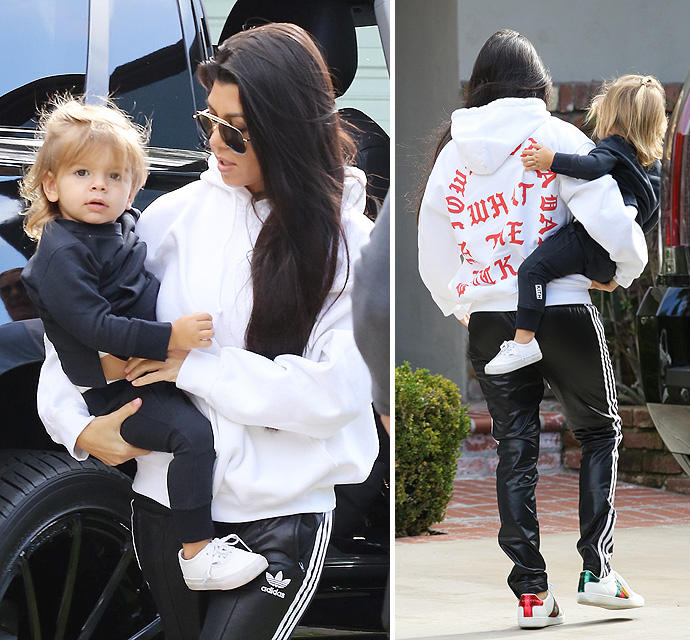 kourtney-kardashian-reign-life-of-pablo-sweatshirt-121216.jpg