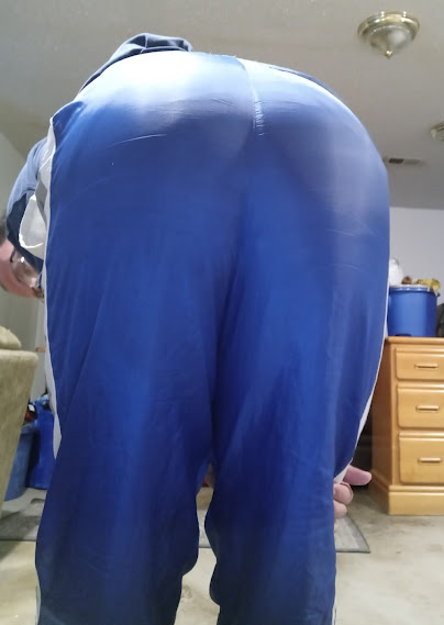 Me bending over in my blue shirt & my small blue GTM Sportswear Nylon Pants 1