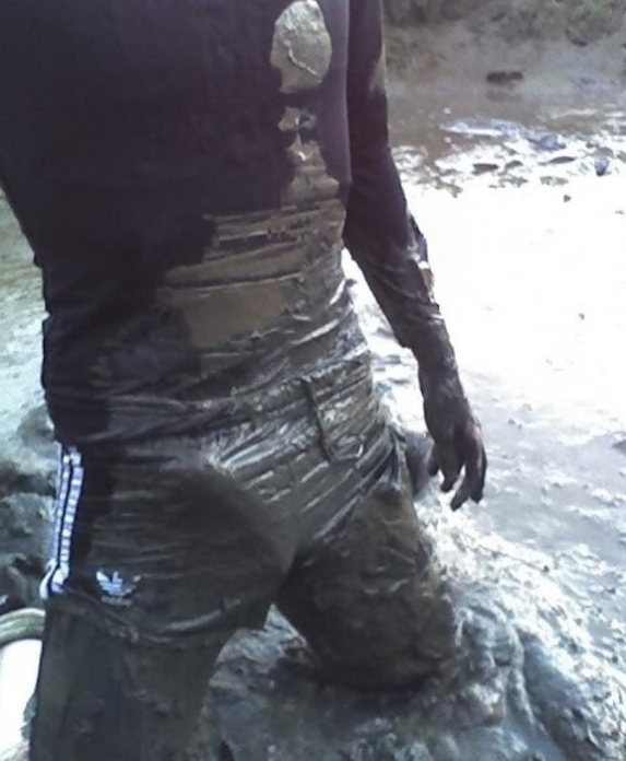 Mud fun in Adidas nylon shorts