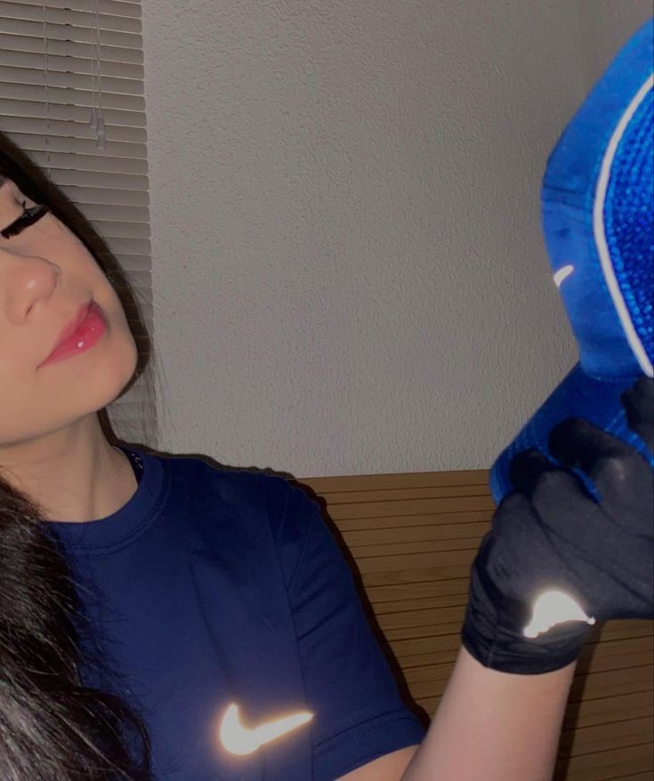 Nasty girl in shiny nike gloves