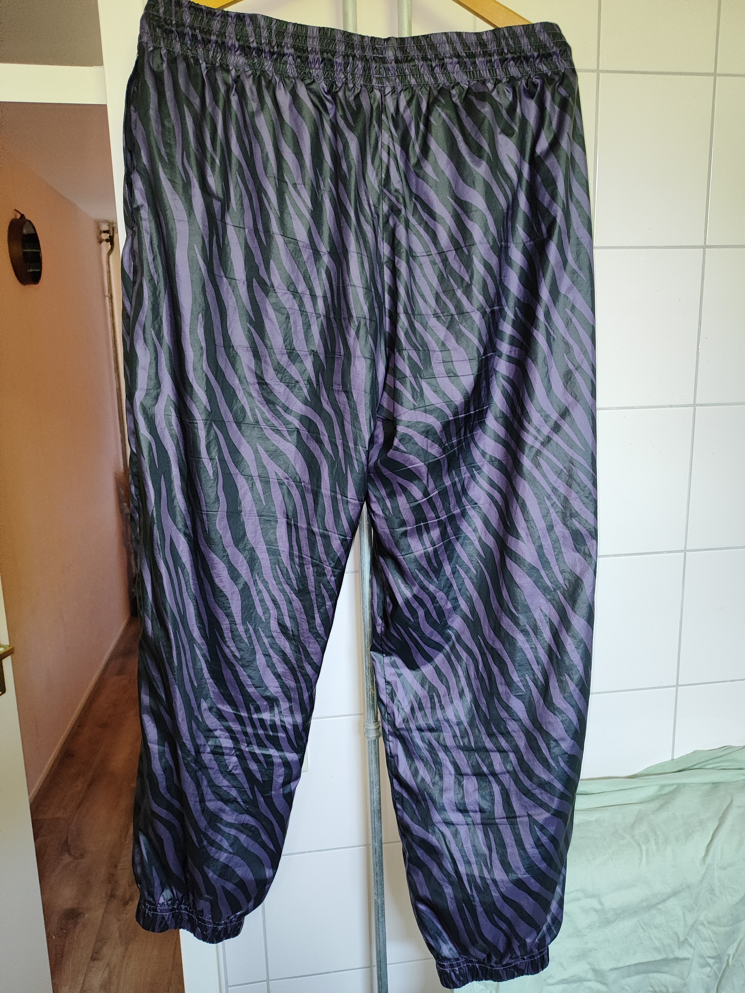 Nike Shiny Nylon Zebra Print Pants. Purple Black.