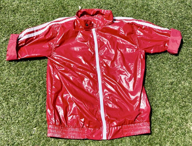 Shiny red jacket - sleeves rolled up